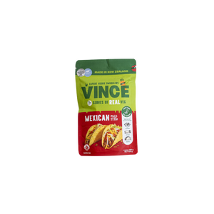 A stand-up pouch of Vince Mexican The packaging features a green top section with the brand name 'VINCE' in large green letters, and an image of a filled taco on the front.