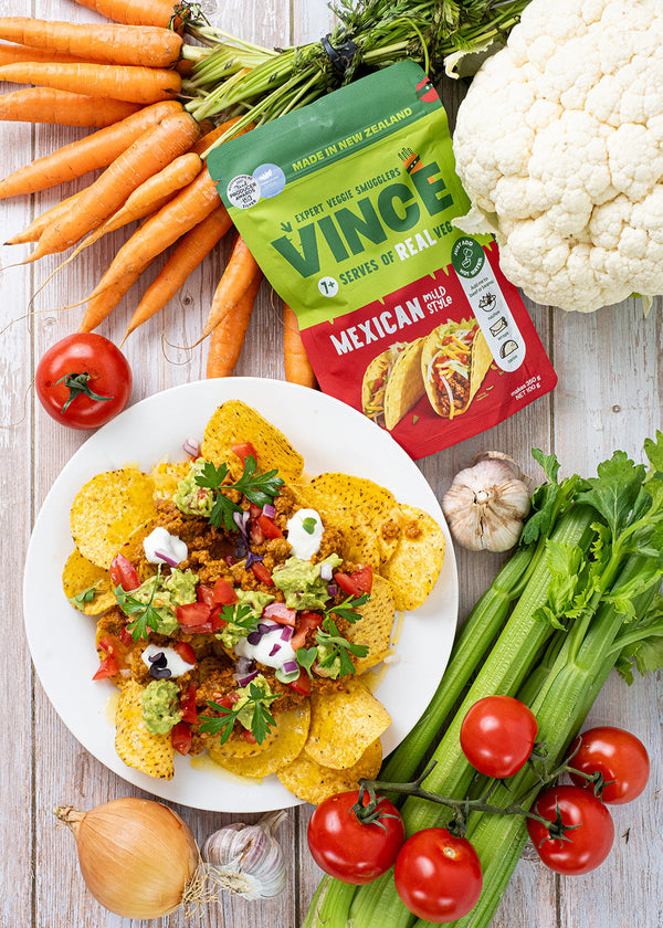 Veggie-packed nachos topped with guacamole, sour cream, and fresh herbs, made with Vince hidden veggie mix and beef mince or beans. Smart, healthy meals for kids in NZ and Australia.